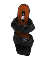 Load image into Gallery viewer, TWISTED STRAP SPOOL HEELED SANDALS

