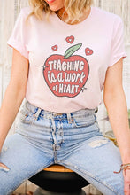 Load image into Gallery viewer, TEACHING IS A WORK OF HEART GRAPHIC TEE
