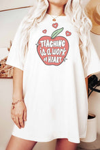 Load image into Gallery viewer, TEACHING IS A WORK OF HEART GRAPHIC TEE

