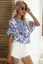 Load image into Gallery viewer, Floral Tie-Neck Curved Hem Top
